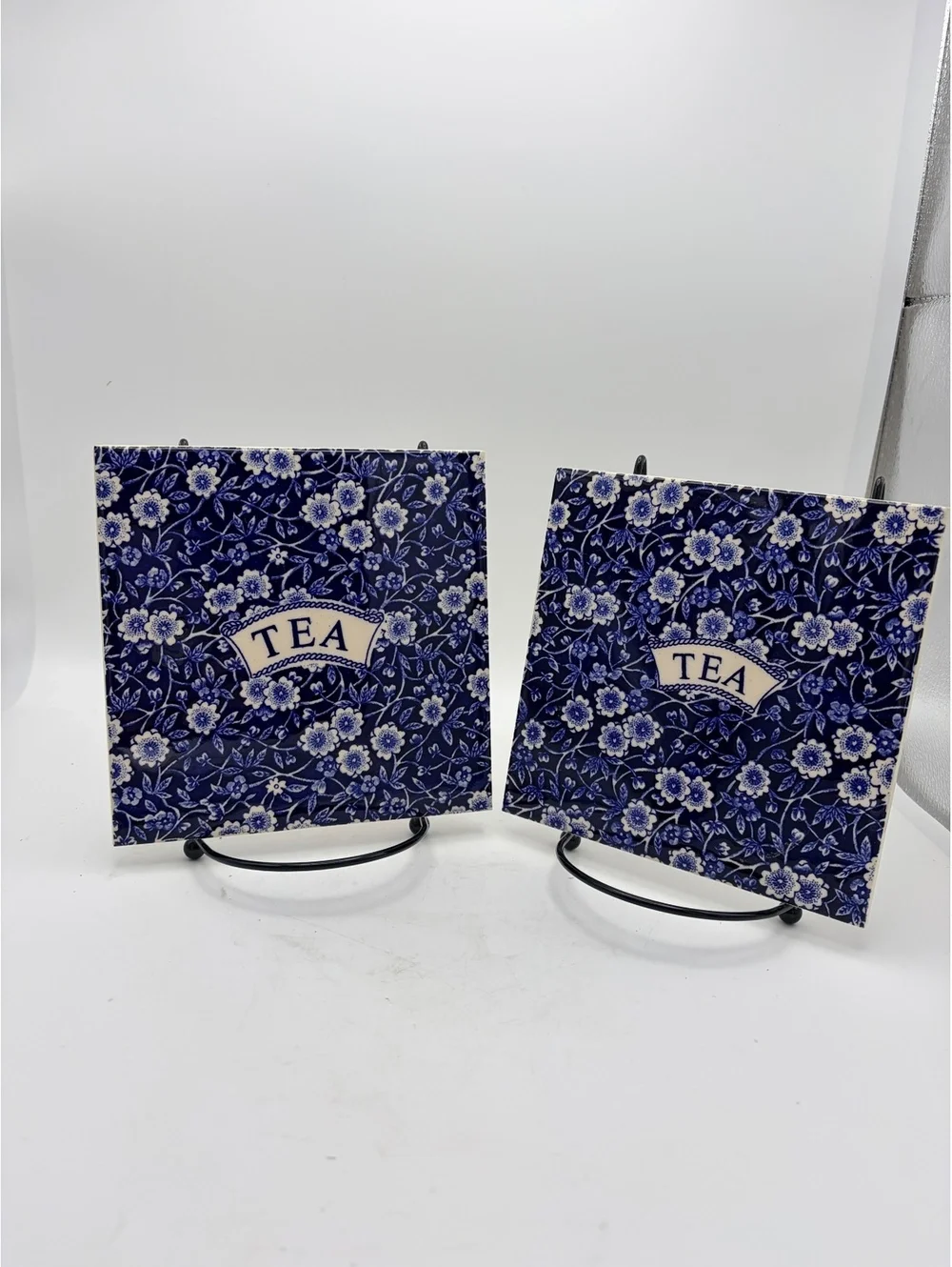 Two vintage 6x6” trivets. 1968